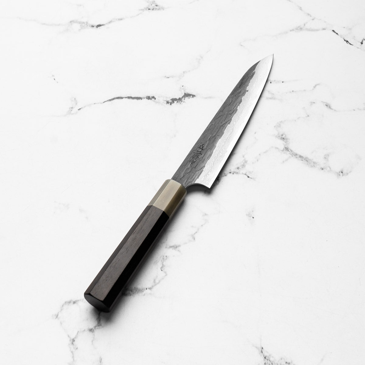 Nigara Hamono VGXEOS Kurouchi Petty 150mm - angled view