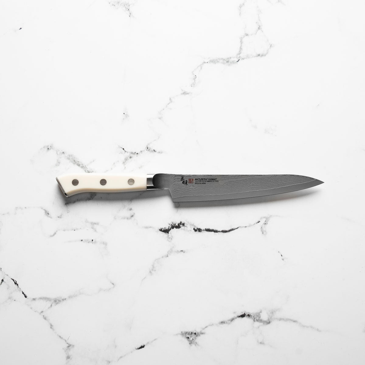 Mcusta Zanmai Corian Classic VG10 Damascus Petty 150mm - handle detail