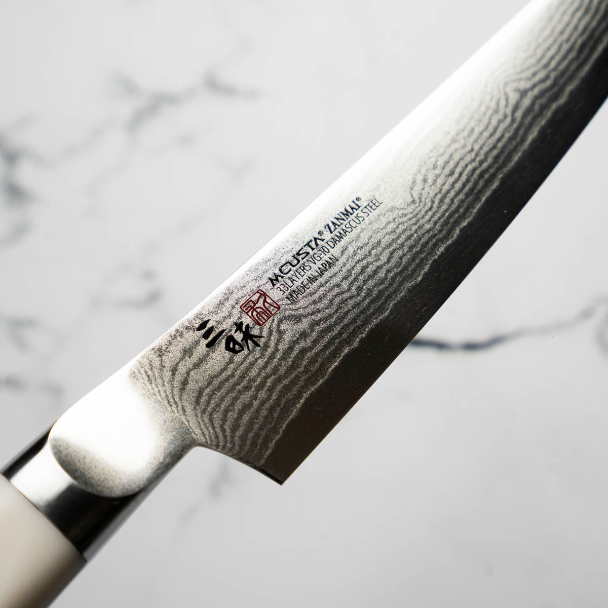 Mcusta Zanmai Corian Classic VG10 Damascus Petty 150mm - view 6