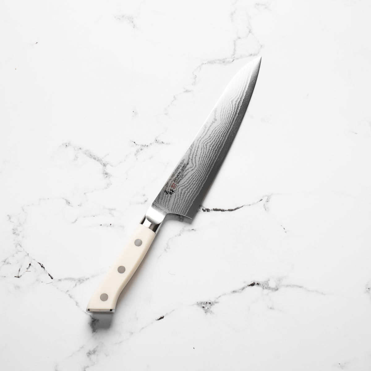 Mcusta Zanmai Corian Classic VG10 Damascus Gyuto 210mm