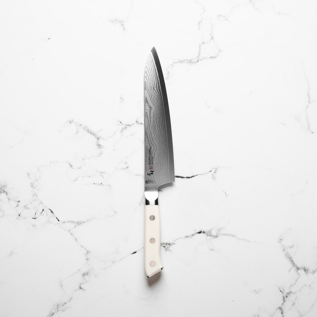 Mcusta Zanmai Corian Classic VG10 Damascus Gyuto 210mm