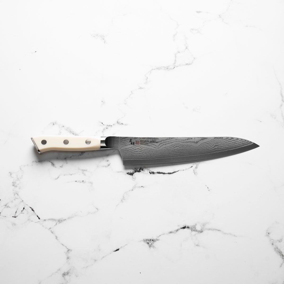 Mcusta Zanmai Corian Classic VG10 Damascus Gyuto 210mm