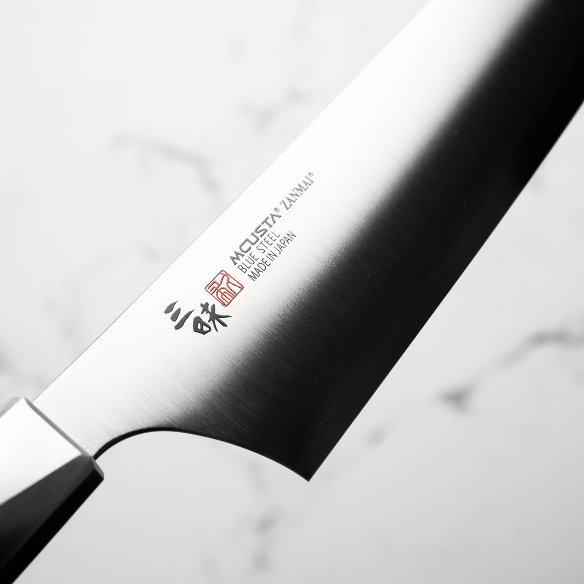Mcusta Zanmai "Beyond" Blue Super Gyuto 210mm